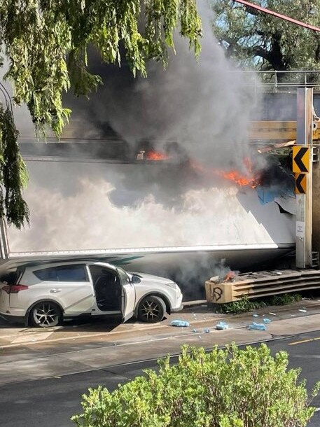 A truck has struck a bridge and collapsed onto a car on Mount Alexander Road, Essendon., Picture: Supplied