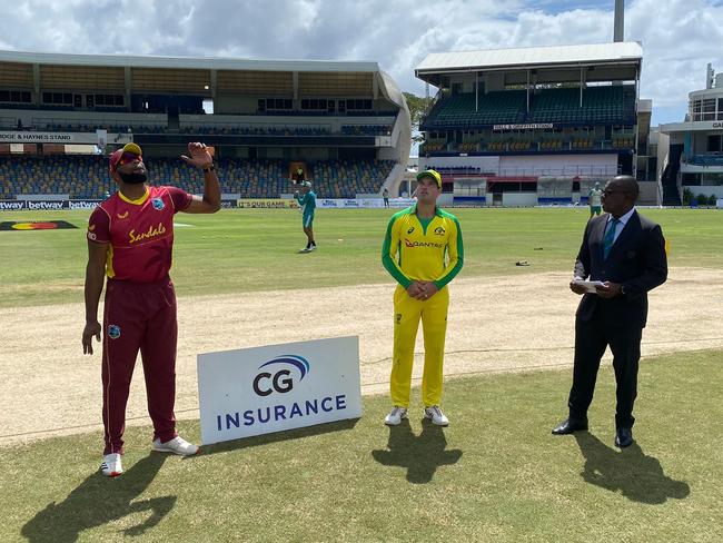 Australian captain Alex Carey (centre) wins the toss ahead of the now-suspended second ODI against the West Indies in Barbados. Picture: Twitter / @cricketcomau