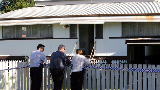 Police at the Sandgate home after the 2005 murder.