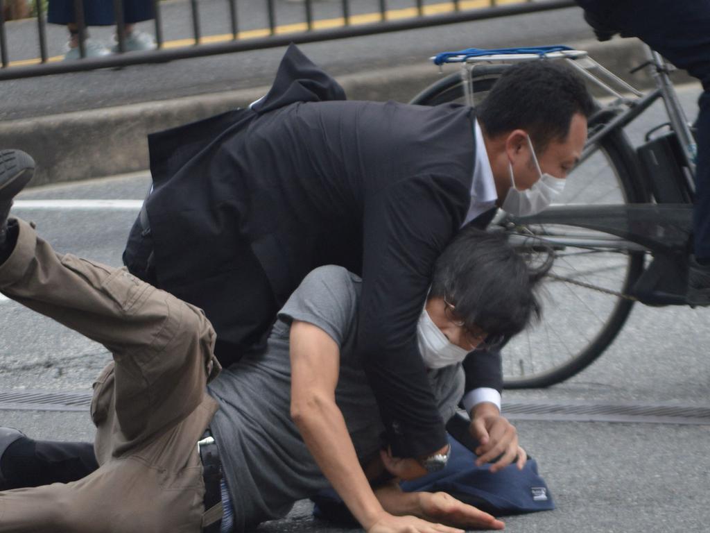 He was tackled to the ground by police but reportedly did not attempt to flee: Picture: AFP