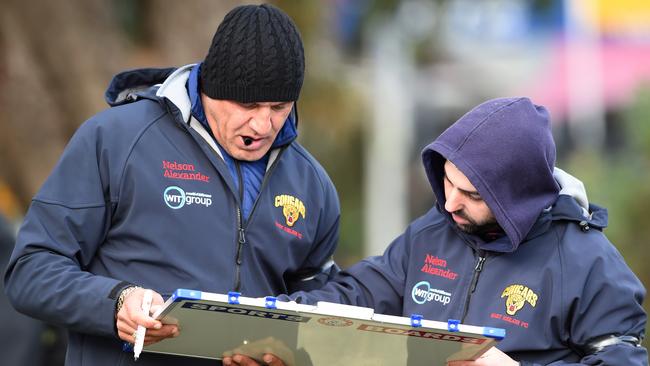 East Keilor coach Pat Christofi (left) works the magnets. Picture: Steve Tanner