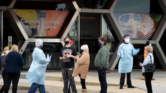 People queue for Covid testing at Caroline Springs Leisure Centre. Picture: Andrew Henshaw