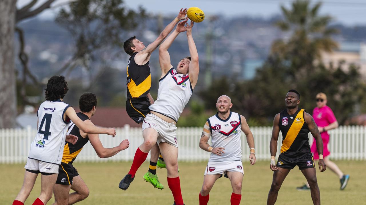 Bailey Glasscock (left) of Toowoomba Tigers and Erik McConnell of Warwick Redbacks. Picture: Kevin Farmer