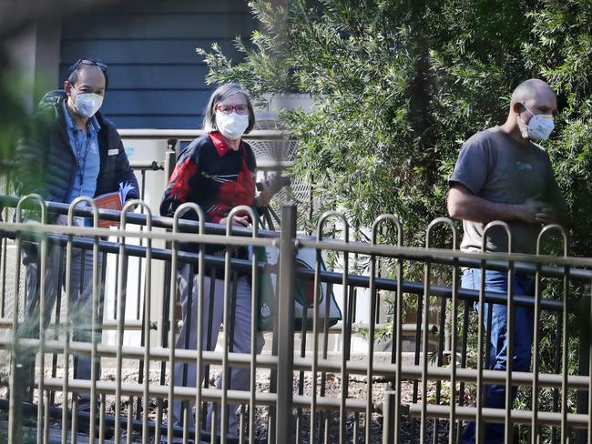 Visitors outside the aged-care facility. Picture: Richard Dobson