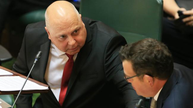 Treasurer Tim Pallas revealed the government would slash spending by $4 billion over four years but Premier Daniel Andrews can still approve bonuses for some executives. Picture: Aaron Francis