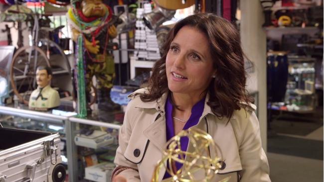 Julia Louis-Dreyfus drops by to hock her prized Emmy award.