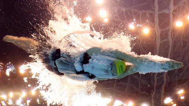 Golden Girl. An incredible image taken using an underwater remote camera shows Ariarne Titmus entering the water on her way to a Gold Medal at the World Aquatics Championships in Fukuoka, Japan. Picture: Quinn Rooney/Getty Images