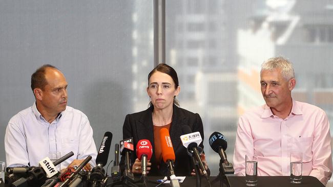 SkyCity chief executive Graeme Stephens, NZ Prime Minister Jacinda Ardern and Fletcher Building CEO Ross Taylor speak to media on October 23, 2019 in Auckland, New Zealand. (Photo by Phil Walter/2019 Getty Images)