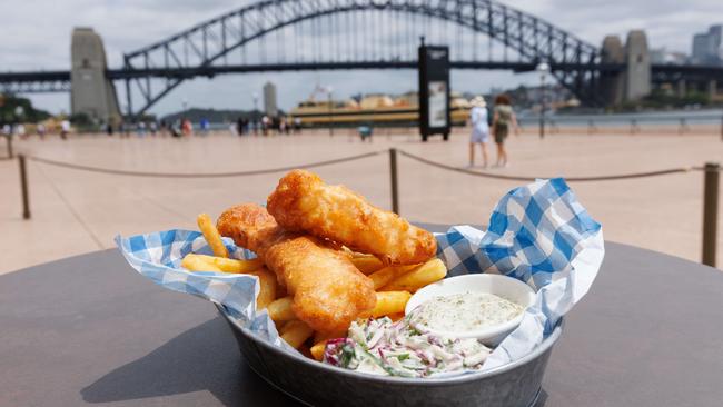 Fish, chips, iconic views: Seafood under the sails of the Sydney Opera House at a pop up restaurant called The Harbour. Picture: David Swift