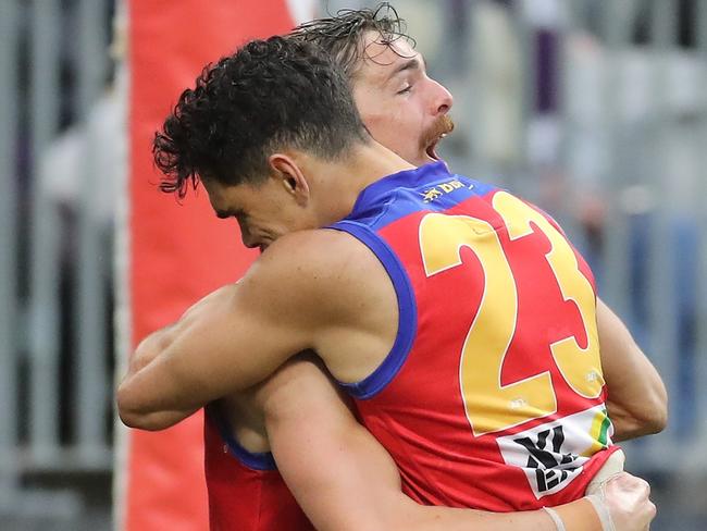 PERTH, AUSTRALIA - AUGUST 08: Joe Daniher of the Lions celebrates after scoring a goal during the 2021 AFL Round 21 match between the Fremantle Dockers and the Brisbane Lions at Optus Stadium on August 8, 2021 in Perth, Australia. (Photo by Will Russell/AFL Photos via Getty Images)