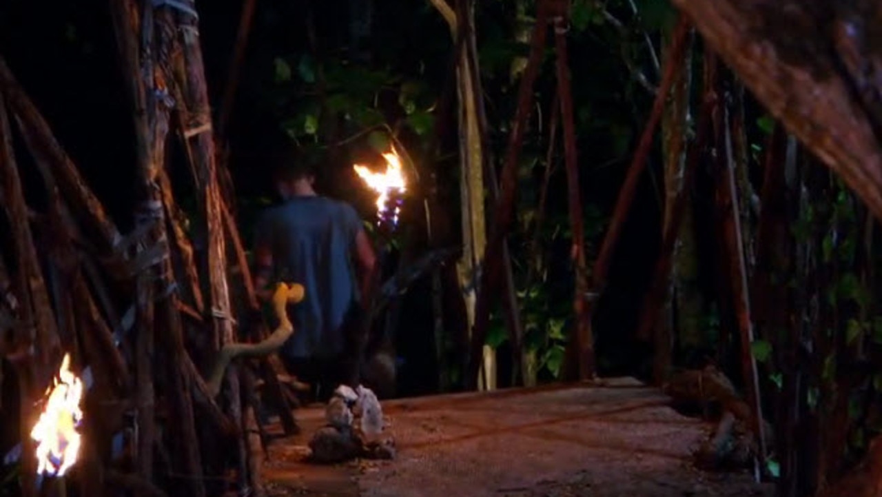 Luke walks away from tribal council — and immediately breaks down.