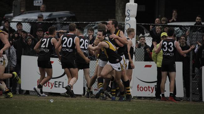 Confusion surrounds the Ringwood camp while the Mitcham players begin to celebrate. Picture: Field of View Sports Photography.