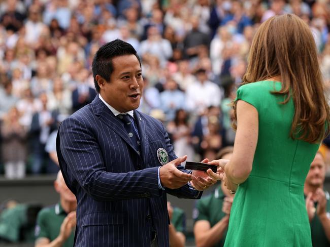 The Duchess of Cambridge makes a presentation to umpire James Keothavong after the Ladies’ Singles Final match. Picture: Getty Images