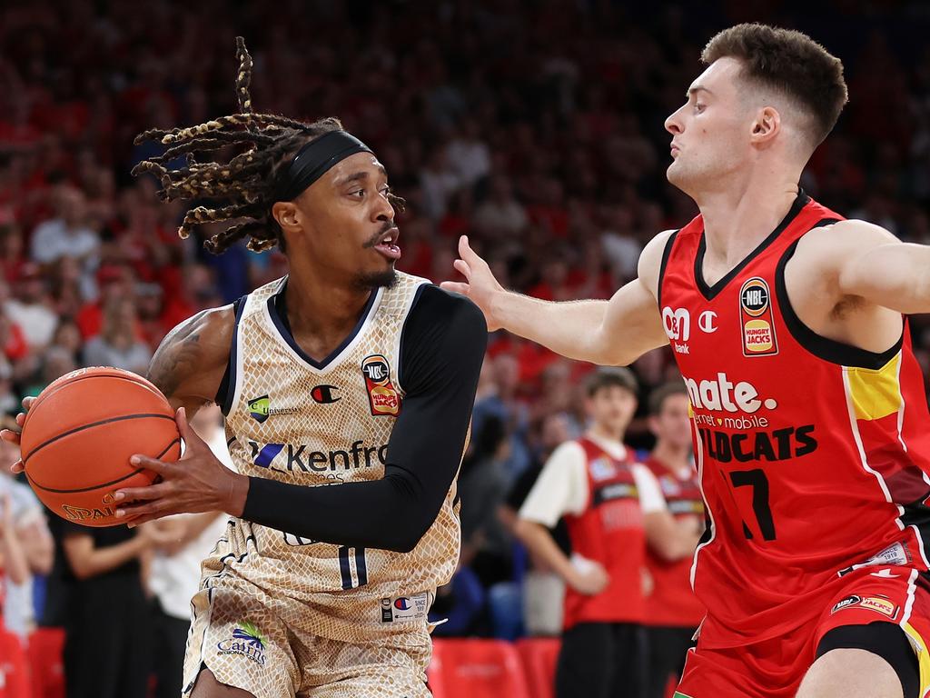 Tahjere Mccall of the Taipans drives to the key against Michael Harris. Picture: Paul Kane/Getty Images