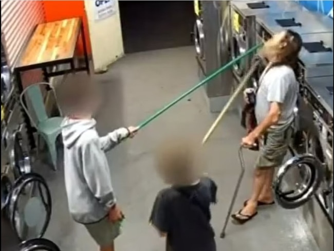 Four boys have used broom sticks to attack a 57-year-old disabled man who went to a laundromat in the early hours of the morning with the whole incident caught on CCTV. Picture: NewsWire handout