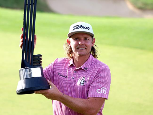 ST ALBANS, ENGLAND - JULY 09: Cameron Smith of Australia poses with the trophy after his win on day three of LIV Golf - London at The Centurion Club on July 09, 2023 in St Albans, England. (Photo by Tom Dulat/Getty Images)