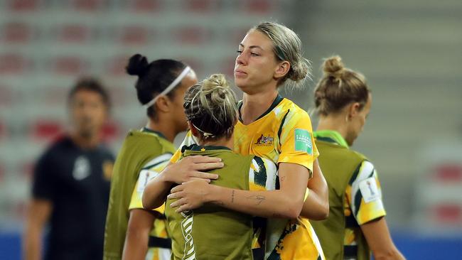 Australia’s Alanna Kennedy is consoled by her teammates. Picture: Getty