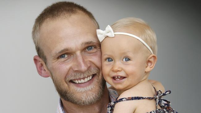 Dr Ian Northeast has coped pretty well with his baby daughter Grace, mainly because he shares care of her during the day with his wife Stephanie. Picture: David Caird