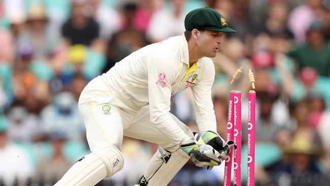 Alex Carey tries to run out Jonny Bairstow on the final day of the Sydney Test. Picture: Getty Images