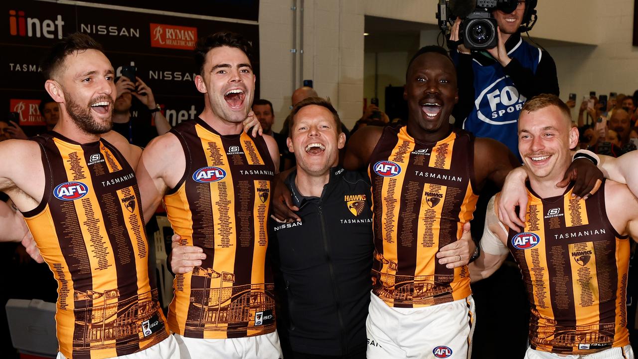 MELBOURNE, AUSTRALIA - AUGUST 11: The Hawks sing the team song during the 2024 AFL Round 22 match between the Carlton Blues and the Hawthorn Hawks at The Melbourne Cricket Ground on August 11, 2024 in Melbourne, Australia. (Photo by Michael Willson/AFL Photos via Getty Images)