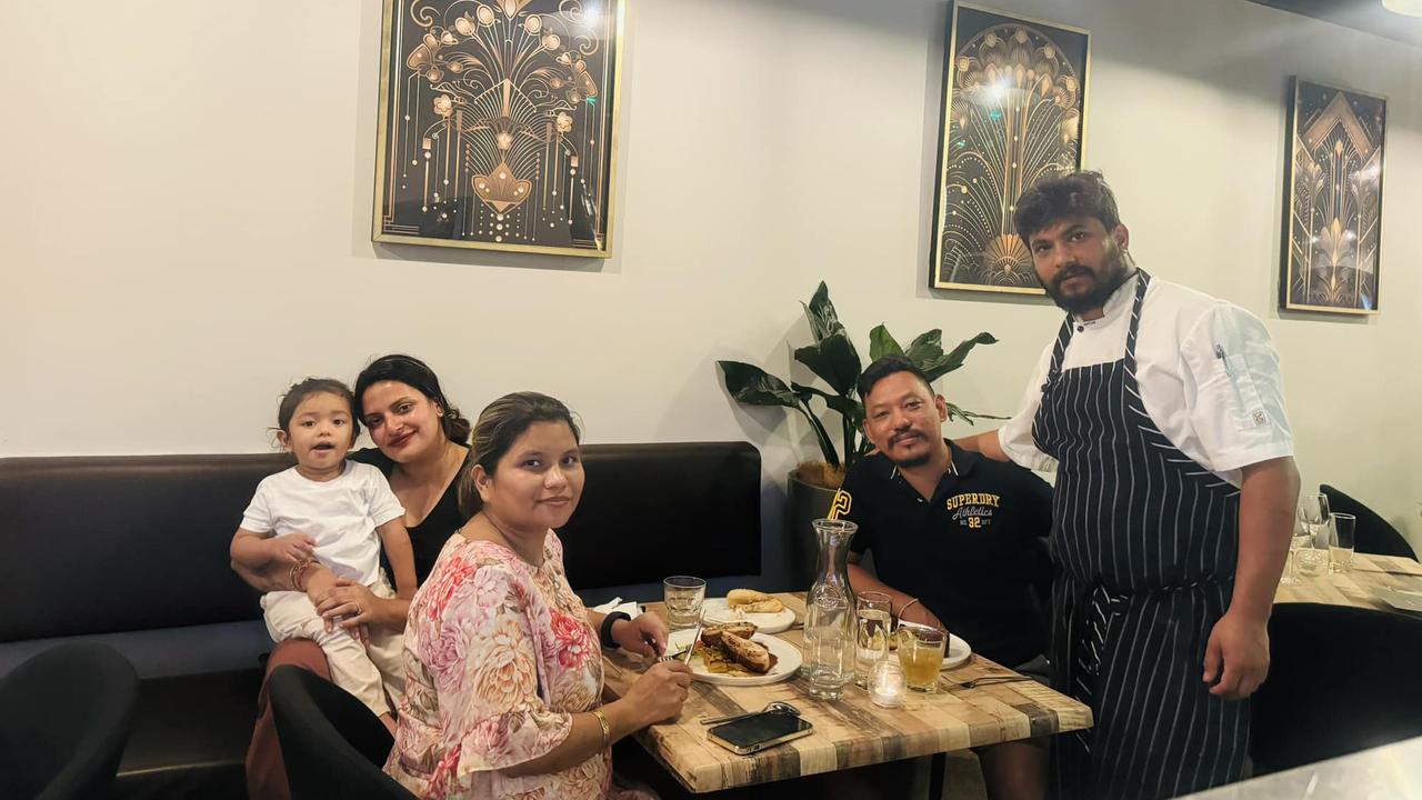 Junoon Restaurant &amp; Bar chef owner Kiran Dhakal (right) alongside customers at his new venue. Picture: Facebook