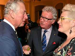 WOW FACTOR: Britain's Prince Charles meets with Australian Singer Katie Noonan at a reception at Queensland Government House in Brisbane. Picture: MICK TSIKAS