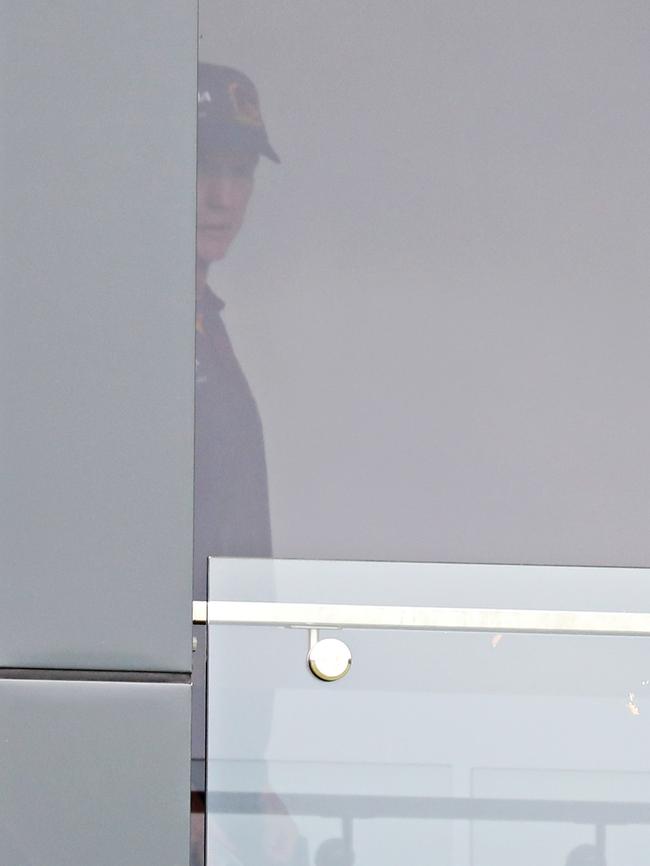 Bennett watches Broncos training from his office on November 22. Picture: Annette Dew