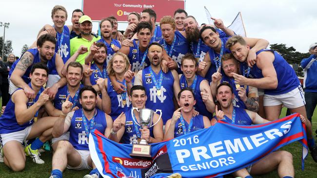 Hastings players celebrate with the premiership cup in 2016. Picture: Mark Dadswell