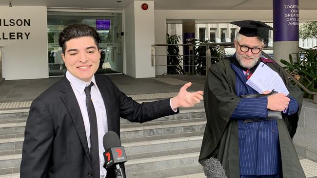 Student activist Drew Pavlou with his barrister Tony Morris QC at University of Queensland on Wednesday.