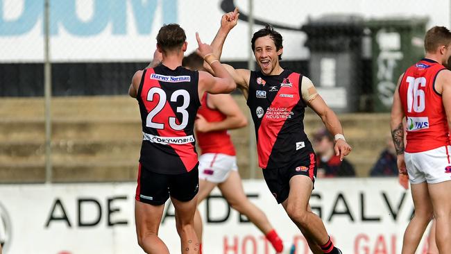 West star Kaine Stevens celebrates a goal against Norwood in 2018 with teammate Errin Wasley-Black. Picture: Tom Huntley