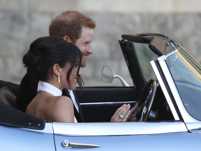 The newly married Duke and Duchess of Sussex drive to their  evening reception at Frogmore House.