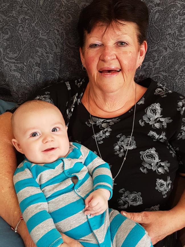 The late Cheryl Budini holding her grandson Thorsen, Darren's son.