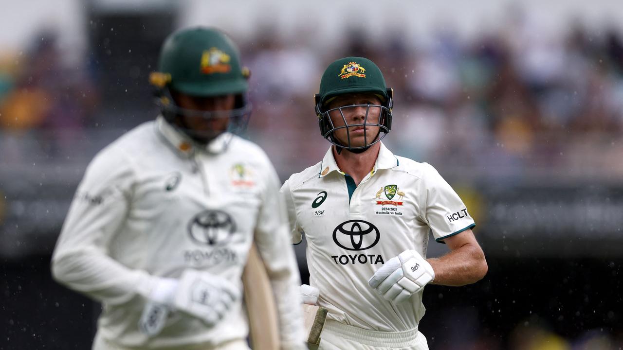 Nathan McSweeney (right) and Usman Khawaja survived when there was play. (Photo by David Gray/AFP)