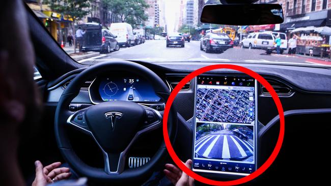 A driver rides in a Tesla Motors Inc. Model S vehicle equipped with Autopilot hardware and software. PHOTO: CHRISTOPHER GOODNEY/BLOOMBERG NEWS