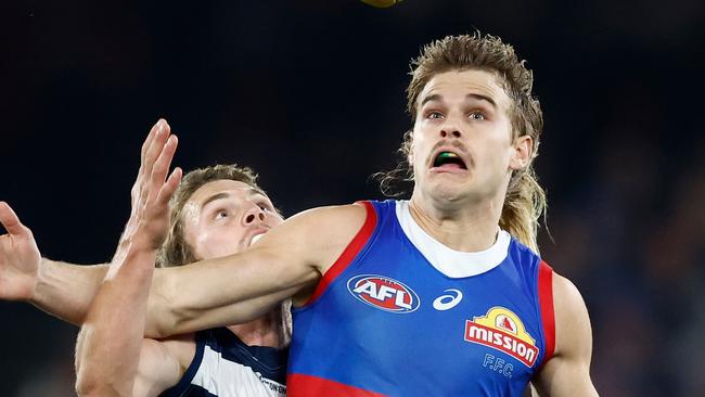 MELBOURNE, AUSTRALIA - JUNE 03: Bailey Smith of the Bulldogs and Tom Atkins of the Cats compete for the ball during the 2023 AFL Round 12 match between the Western Bulldogs and the Geelong Cats at Marvel Stadium on June 3, 2023 in Melbourne, Australia. (Photo by Michael Willson/AFL Photos via Getty Images)