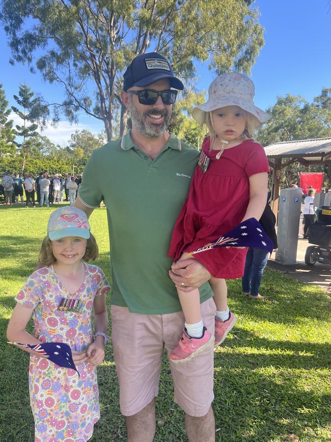 A family at the Anzac Day service.