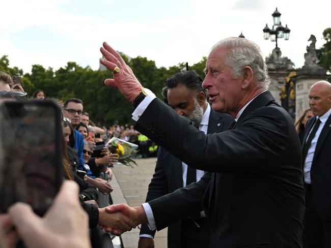 Britain's King Charles III greets the crowd at Buckingham Palace. Picture: AFP.