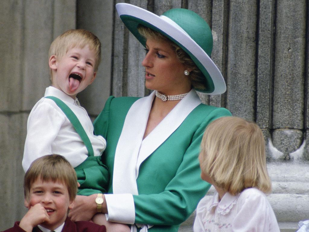 Prince Harry shows Prince Louis how it’s done. Picture: Tim Graham/Getty Images