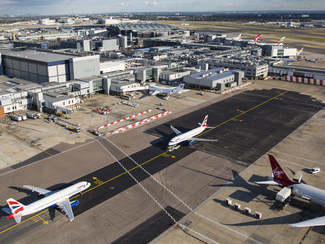 LONDON, ENGLAND - OCTOBER 11: A general view of aircraft at Heathrow Airport on October 11, 2016 in London, England. The UK government has said it will announce a decision on airport expansion soon. Proposals include either a third runway at Heathrow, an extension of a runway at the airport or a new runway at Gatwick Airport. (Photo by Jack Taylor/Getty Images)