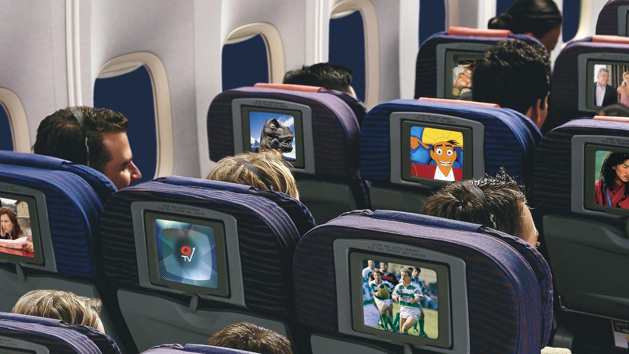 Qantas has apologised after screening an R-rated film on all the seat back screens on a flight to Tokyo.