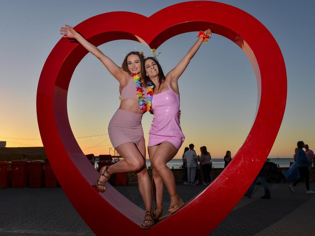 Nicole Parkes and Jacinta Russo at Glenelg for New Year. Pic: Brenton Edwards