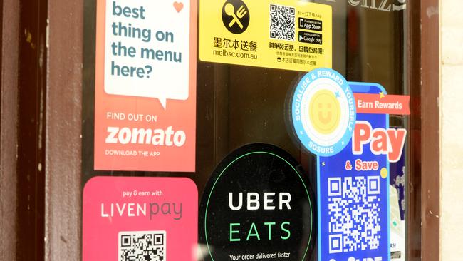 An old Zomato sticker advertising its delivery and review platform. Picture: NCA NewsWire/Andrew Henshaw