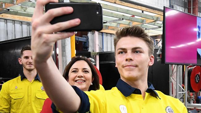 Apprentice Sage Maxwell takes a selfie with Queensland Premier Annastacia Palaszczuk. Picture: NCA NewsWire / Dan Peled