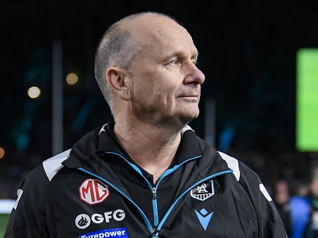 ADELAIDE, AUSTRALIA - SEPTEMBER 13: Ken Hinkley, Senior Coach of the Power  walks off the ground  after  the AFL Second Semi Final match between Port Adelaide Power and Hawthorn Hawks at Adelaide Oval, on September 13, 2024, in Adelaide, Australia. (Photo by Mark Brake/Getty Images)