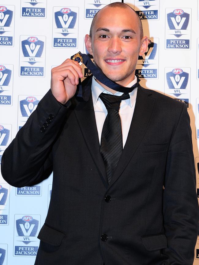 Alex Woodward wins the 2014 VFL JJ Liston trophy. Picture: AFL Media.