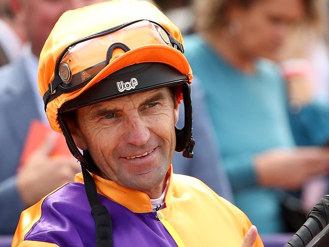 MELBOURNE, AUSTRALIA - MARCH 07: Jockey Dwayne Dunn reacts after riding Spend to win race 3 the Nova 100 Trophy during Melbourne Racing at Flemington Racecourse on March 07, 2020 in Melbourne, Australia. (Photo by Kelly Defina/Getty Images)