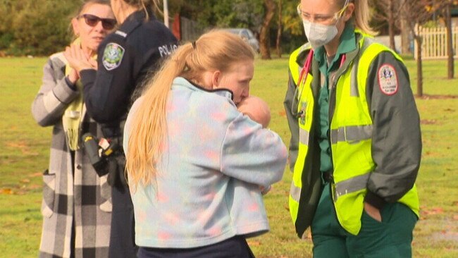 Mum kisses her four-month old baby when they were reunited after her car was stolen. Picture: NINE NEWS