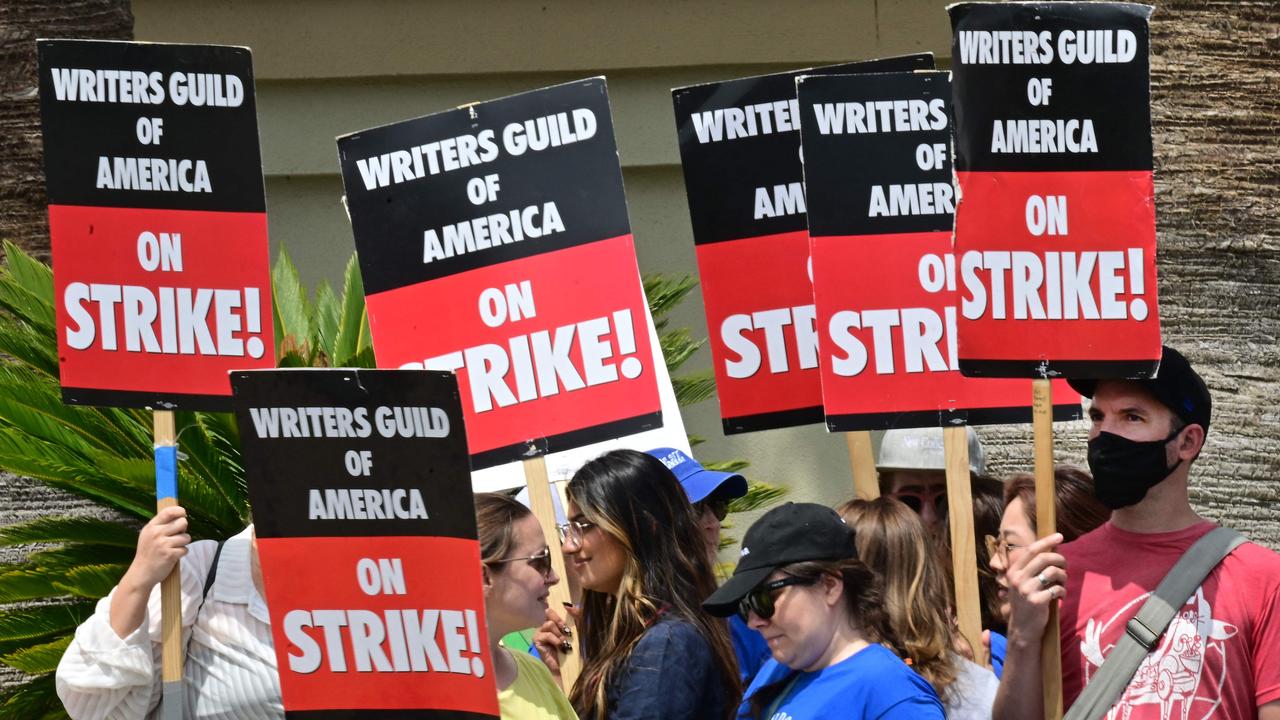 Writers hold signs while picketing in front of Paramount Studios in LA on May 15. Picture: Frederic J. Brown/AFP