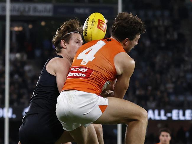 MELBOURNE, AUSTRALIA - APRIL 20: Toby Greene of the Giants collides with Jordan Boyd of the Blues during the round six AFL match between Carlton Blues and Greater Western Sydney Giants at Marvel Stadium, on April 20, 2024, in Melbourne, Australia. (Photo by Darrian Traynor/Getty Images)