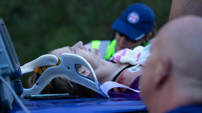 Cyclist Peter Franc had to be treated on the roof of a car after a collision on Thursday morning. Picture: Charlie Coquillard